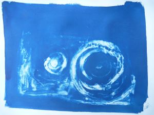 Two moons: ink and wash on plastic, with carborundum powder